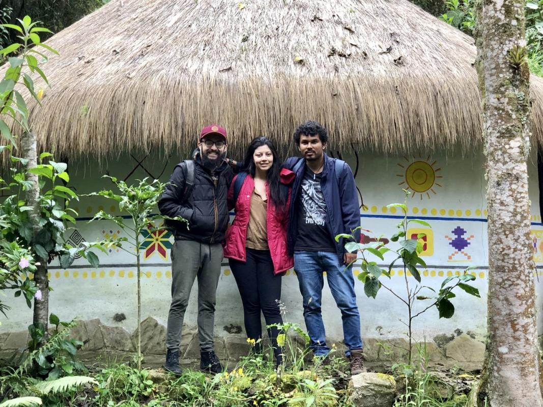 Julián Gutiérrez-Martínez stands outside with two colleagues during a fieldwork trip to Colombia