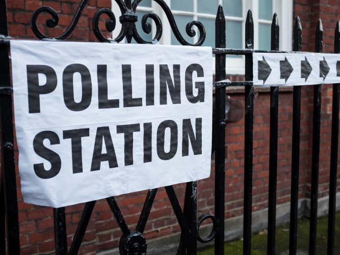 Image of sign outside of a polling station