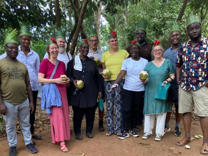 Members of the STREAMS project stand outside under the trees