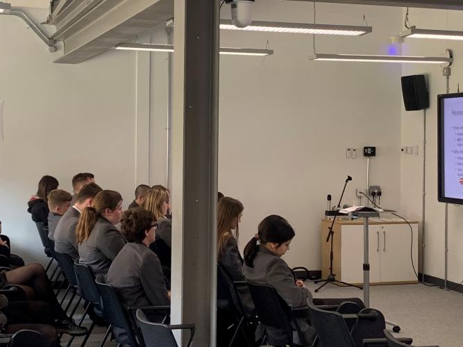 Dr Lindsay Richards lectures to the group of students