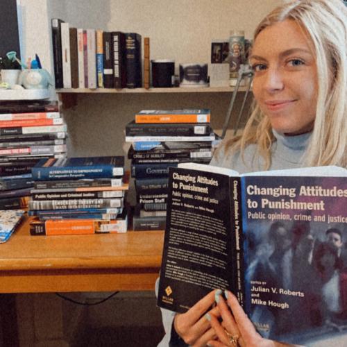 Helen surrounded by books