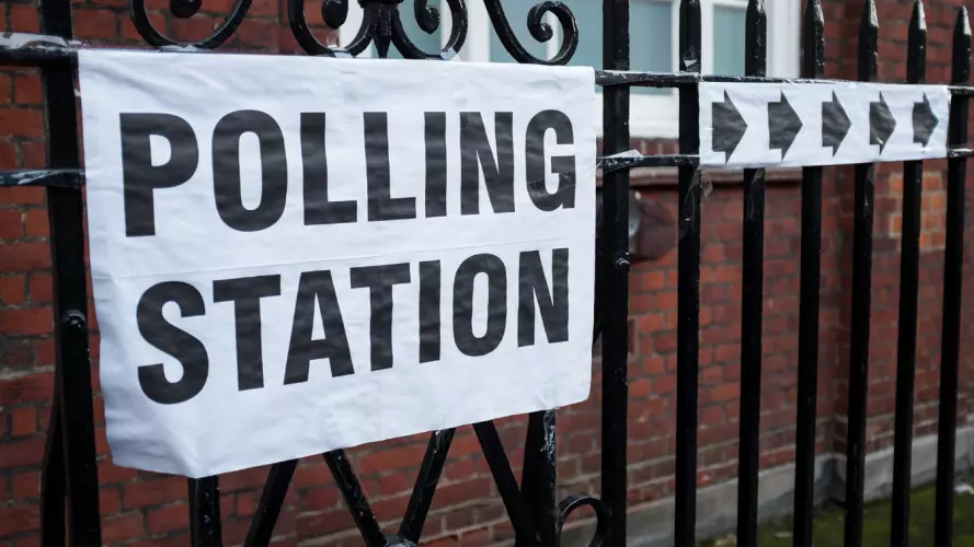 Image of sign outside of a polling station