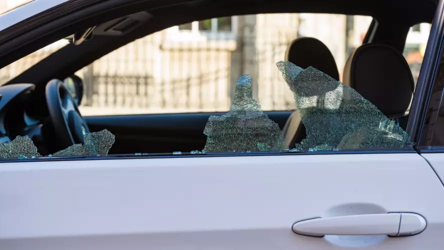 Image of a smashed car window
