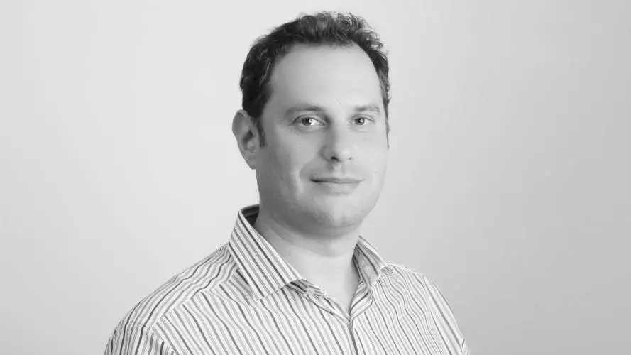 Black & white image of Jonathan Lusthaus