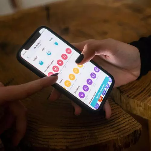 Image of a phone screen showing a period tracking app