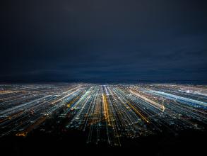 A city at night with blurred light trails