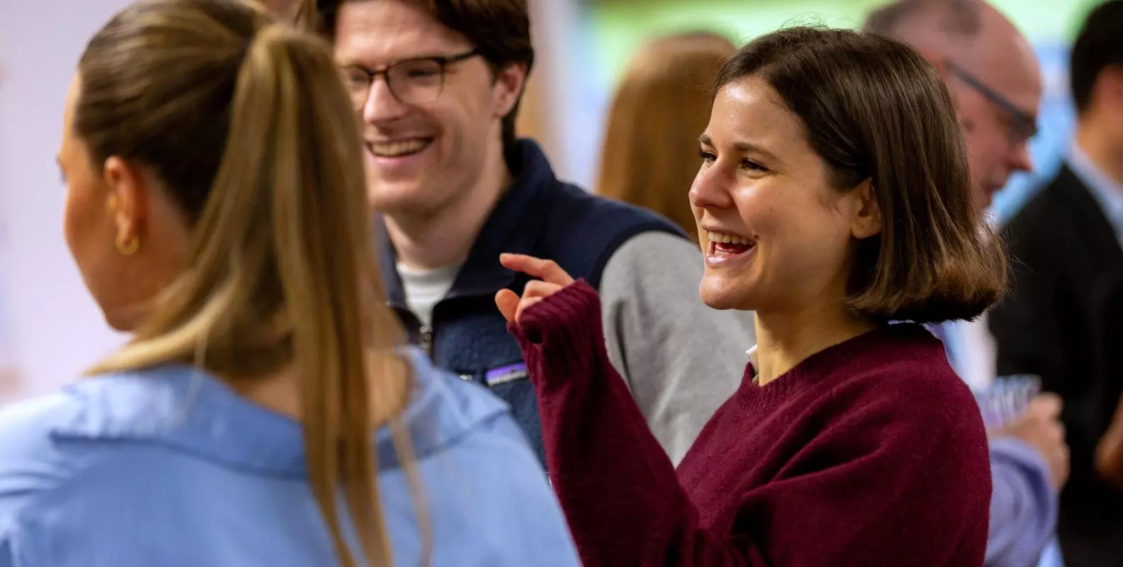 Image of people talking in the Department
