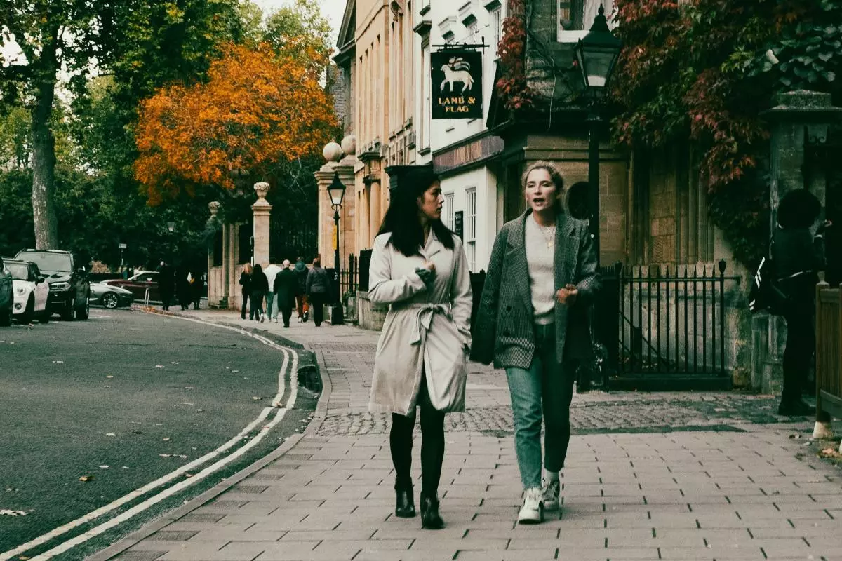 Students walk along St Giles street