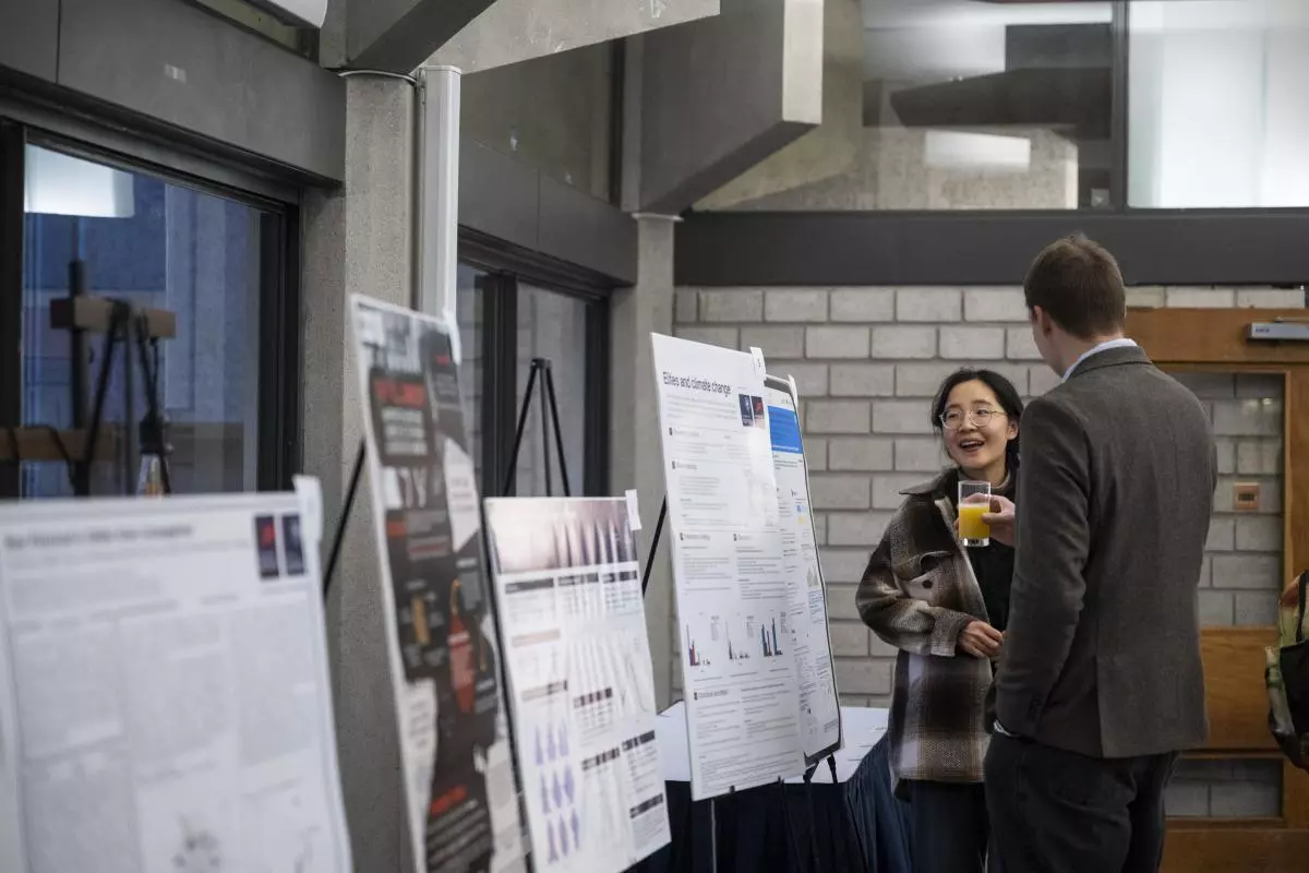 Image of guests viewing student academic posters